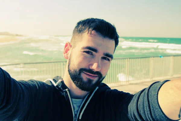 files/depositphotos_66302855-stock-photo-selfie-portrait-of-young-man.webp